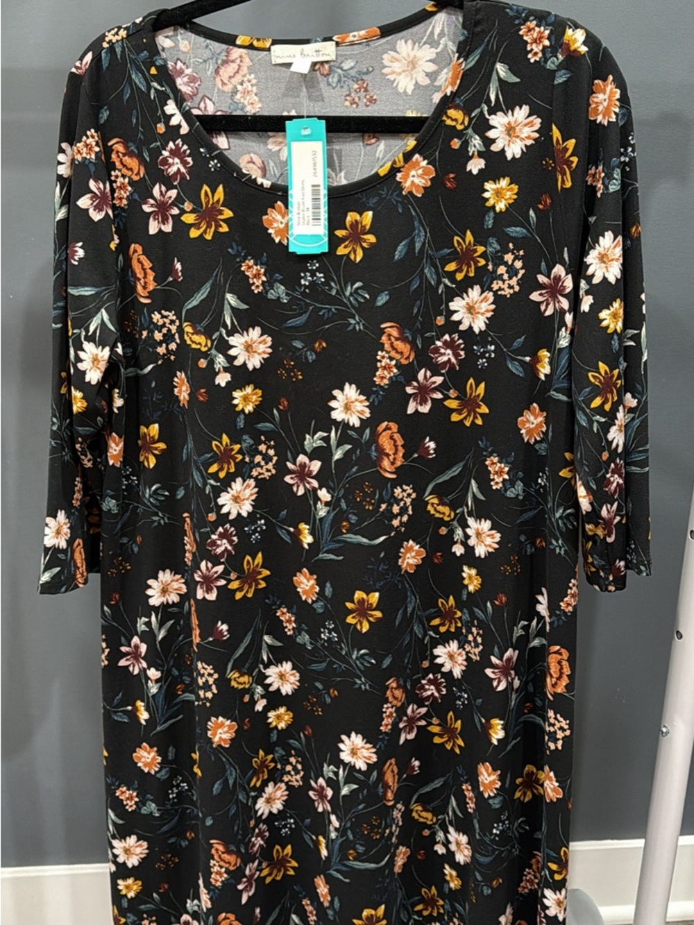nine britton Black Floral Midi Dress with Warm Tones
